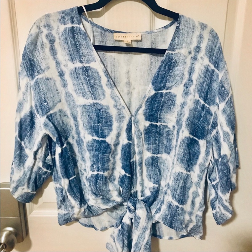 Blue tie-dye tie front crop top The size is a very generous small. Medium fit.